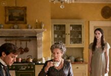 They laughed when his mother called me “a charity case” at the dinner table. I stayed silent—until the man at the podium said, “Please welcome our benefactor, Mr. Harrison… and his daughter.” The room went dead quiet. My husband whispered, “Paisley… why didn’t you tell me?” I smiled. “Because tonight wasn’t about revenge.”It was about truth finally walking in.