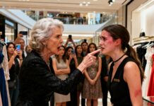 The slap echoed through the store. My face burned. Phones were raised. “That’s what happens when people like you forget your place,” she sneered. I wanted the floor to swallow me—until a deep voice cut through the silence. “You just assaulted my wife.” I froze. Wife? I had never seen this man before. But the fear on her face told me everything was about to change.