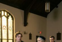 “My phone buzzed. It was my brother, his voice cold as ice: ‘Mom died last night. Don’t bother coming to the funeral—she left every cent to me. You get nothing.’ My heart should have shattered, but instead, I looked to my left. There she was, sipping tea and smiling at me. ‘Is that so?’ I whispered into the phone, my grin widening. The game was on, and he had no idea who was really buried.”