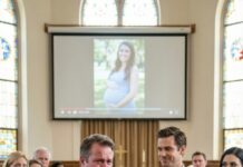 I stood at my pregnant daughter’s funeral gripping the edge of the pew—until my son-in-law walked in… with his mistress on his arm, smiling like this was a party. I heard myself hiss, “You have the nerve to show your face?” He leaned close and whispered, “Relax. After today, it’s all mine.” Then the lawyer cleared his throat: “Before we read the will… there’s something you all need to know.”