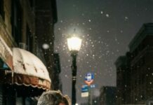 Snow was biting my hands, and I saw her shivering on the sidewalk. I hesitated, then muttered, “Here… take my coat.” She looked at me like I’d lost my mind. “Why would you do that?” she asked. I shrugged, heart pounding. “Because someone has to care.” She walked away, and I watched her disappear into the bus lights. Alone again, I whispered, “Maybe I’m invisible—but maybe not for long.”