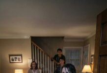 Rain soaked through my coat as I found my daughter on her knees in the driveway, trembling—because her husband “taught her a lesson” for buying a simple new dress. From inside the house, I heard his mother cackle and his brothers cheer. My daughter whispered, “Mom… please don’t make it worse.” I lifted her chin, saw the bruise, and kicked the door open. I stared straight at him and said five words: “Get up. This ends today.” Then the laughter stopped… and the real punishment began.