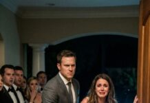 My husband gripped my arm so tightly I could feel the bruises forming. “Get out of my house!” he shouted, his voice echoing in front of fifty silent guests. I remember thinking, Is this really how five years end? My tears blurred the faces watching me fall apart. Then headlights flooded the driveway. A stranger stepped out and said one sentence that changed everything: “Maria… I’ve been looking for you.” That was the night I stopped disappearing.