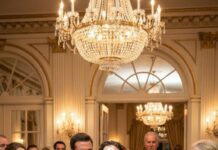 The cake hit my face—and the entire ballroom laughed. “Oops,” my mother-in-law said sweetly, while my sister-in-law whispered, “This is going viral.” They thought I was just a broke kindergarten teacher who trapped their billionaire son. But when my husband grabbed the mic and said, “Her real name is Emily Hayes,” the laughter stopped. And when my father walked through those doors? That’s when their world collapsed.