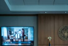 I stood in court with my palms sweating when my husband said, voice steady, “I want the house, the cars—everything… except the boy.” My throat closed. Then my seven-year-old tugged my sleeve and whispered, “Mom, please.” He faced the judge. “Your Honor, can I show a video?” The screen lit up. One clip. One moment. And suddenly, the courtroom fell into a silence so heavy it hurt. Then my husband went pale.