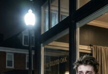 He slid the billfold shut and stood up. “No tip,” my manager hissed, eyes wide. Under his plate, I found a note: “Go to this address if you want the truth.” I laughed—until the billionaire paused at the door and said, “Tell your mother I’m sorry.” My hands shook as I drove there. The mailbox had my last name. Inside: a photo of him holding a baby… me. And one line: “Your real father is alive.”