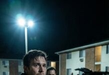 The boy stood far away, eyes wide—screaming without sound. He thrust his hand forward, frantic: “Run… now.” I froze, my heartbeat pounding like a warning siren. “What are you talking about?” I whispered. He shook his head violently, lips trembling: “Don’t look behind you.” I turned anyway—and the sight stole my breath. Worse? I recognized it. Because deep down, I knew it had been waiting for me… long before I arrived.