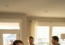 I went to bed without a word, my cheek still burning where his hand landed. At dawn, I flipped pancakes like nothing happened, laid out syrup, fruit, and every treat he loved. He swaggered in, sniffed the air, and smirked. “Good,” he said. “You finally understood.” Then he saw who was already seated at the table—calm, waiting, eyes locked on him. His smile died. Mine didn’t. And that’s when the knocking started…