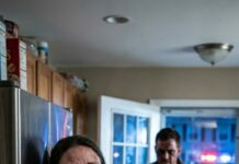 The refrigerator bit into my spine as he slammed me back, his breath hot with rage. “Stop lying,” he hissed. I barely had time to whisper, “I’m carrying your child,” before his knee snapped up—white light exploding behind my eyes. I collapsed, shaking, both hands shielding my swollen belly. “Please… not the baby,” I choked. He crouched close, smiling like a stranger. “Then tell me,” he said softly, “whose is it?” And that’s when I realized the door was unlocked.