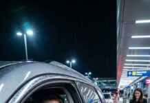 The second we left the airport, the silence in the car felt wrong—too heavy, like it was holding its breath. My wife had waved, smiled, promised, “I’ll call when I land.” I believed her. I needed to. Then my eight-year-old leaned close, his voice shaking as if the words hurt. “Dad… that wasn’t Mom.” I laughed once—too loud. “Buddy, don’t—” His eyes didn’t blink. “She smelled different. And… she didn’t know our secret knock.” The road blurred. My hands locked on the wheel. If that woman wasn’t my wife… then who did I just leave at the gate? And why did my phone light up with a message: I’m still here.