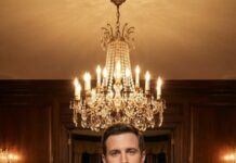 The envelope slid across the table and my father-in-law said, “Sign it, take the $500,000, and disappear.” My wife froze. Her mother wouldn’t even look at me. They thought I was a nobody — a struggling analyst who married into money. I picked up the check, smiled, and said, “Before I answer, you should know I own 47% of your company.” The silence that followed shattered everything they believed about me… and about power.