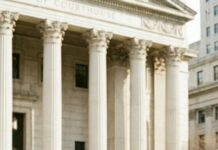 “Put your hands down,” the cop snapped—then his palm cracked across my cheek, right here in the courthouse, where justice is supposed to breathe. The room froze. I tasted iron and heard someone whisper, “She’s just… a Black woman.” I didn’t flinch. I didn’t beg. I only said, quiet enough to cut: “You’re in the wrong courtroom.” Seconds later, I walked past him, robe waiting, name already on the docket. And when I took the judge’s seat… his face finally understood.