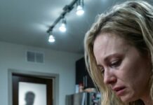 He left—and something in me shattered with him. I drifted through the week like a ghost until a courier handed me a plain, nameless box. My fingers trembled as I lifted the lid. Inside lay our old keepsake scarf… stiff with dried blood. “Don’t open it,” his voice crackled from a voicemail I’d somehow never heard. My breath caught. Because beneath the scarf, there was something else—something waiting for me to say its name.