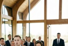 I watched them rehearse their vows like I was invisible—my billionaire husband in a tailored suit, my half sister in a white gown that should’ve choked her. “Say it louder,” he laughed. “I deserve perfect.” I clutched my stomach. “You’re really doing this… to me?” He leaned in, voice like ice: “You got fat. You got boring. Don’t embarrass me here.” She smiled, sweet as poison. “I’ll raise his heir better than you ever could.” When the officiant asked, “Do you take—” the doors slammed open. A deep voice cut through the chapel: “Stop the wedding.” Everyone turned. And that’s when his face went white—because the secret he buried was walking straight toward the altar.