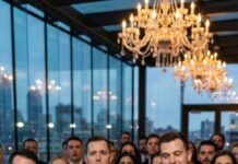 At my husband’s promotion party, crystal glasses clinked and applause filled the room. Then his mistress stepped forward and slapped me hard across the face. Gasps erupted. My husband laughed. “Relax,” he said, smirking. My cheek burned—but I smiled. Because as the music swelled and eyes turned away, I whispered to myself, Enjoy this moment. Minutes later, the celebration became my revenge.