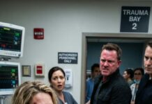 I never told my husband who I truly was. After a horrific car crash, I lay in the ER still coughing up blood. When he barged in, he wasn’t worried—he was furious. “Don’t die on my dime,” he snarled, yanking the IV from my arm as blood soaked the sheets. “You’re a useless burden.” When I cried out, he grabbed my hair and smashed my head against the bed rail. “Stop acting,” he hissed, spitting at my injuries as he tried to drag me off the bed. Then a calm, steady voice cut through the chaos: “Sir… step away. Now.” What happened next changed my life forever….