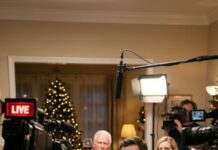 Christmas Eve. Cameras rolling. My parents beamed at my brother and Dad said into the mic, “This is what success looks like.” Then Mom turned to me and laughed, “And this one? A total failure.” I smiled—quietly—while the room roared. If they only knew the “nobody” they were humiliating owned a $350M empire under a name they’d never heard. The producer whispered, “We’re live in 3…2…” and my phone lit up. That’s when everything snapped.