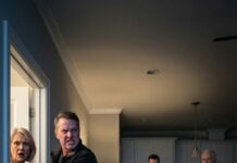 My daughter called me crying, “Dad, please come get me.” When I arrived at her in-laws’ house, her mother-in-law blocked the door and said, “She’s not leaving.” I pushed past her—and the moment I saw my daughter on the floor, I realized this wasn’t “family drama.” It was something they’d been hiding on purpose. They thought I would leave quietly. They had no idea the fury of a father was about to burn their entire world to the ground.