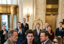 On our “luxury” trip, my parents treated Grandpa like trash. In the hotel lobby, Mom hissed, “Get out!” while Dad shoved a crumpled $100 into his face. “Take it and stop embarrassing us,” he snapped. Grandpa didn’t flinch—he just looked at me and whispered, “Tonight, you’ll learn who they really are.” Hours later, in a locked suite, he revealed one truth so brutal it cracked our family in half… and I’m still not sure I’m ready to tell you why.