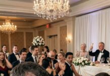 I found my place card at my own son’s wedding—and my stomach dropped. It didn’t say “Father of the Groom.” It said, “Low educated maintenance worker. Fake dad.” My hands shook as laughter spread from the head table. Then Tyler stepped behind me, grabbed the card, and whispered, “Dad… we’re leaving.” I choked out, “Don’t ruin your wedding.” He turned, eyes burning, and said, “They already did.”