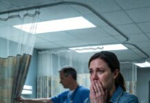 At 2 a.m., my phone screamed in the dark. A police officer’s voice cut through me: ‘Ma’am… your husband is in the hospital. We found him with a woman.’ I drove like I was running from my own thoughts. At the ER, the doctor stopped me at the curtain, eyes heavy: ‘What you’re about to see may shock you.’ He pulled it back— and the world tilted. My legs gave out the second I saw what was waiting beside him. And that was only the beginning…