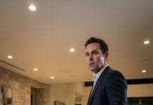 I walked back through my front door still tasting her lipstick, still hearing the flash of cameras and the model’s laugh in my ears. “Just a vacation,” I told myself. “Back to normal.” My wife didn’t look up from the kitchen table. She slid an envelope toward me and said softly, “You left this in your suitcase.” Inside was a pregnancy test—and not mine. I tried to speak, but she smiled like she’d been waiting. “Relax,” she whispered. “Tonight, we start over… my way.”