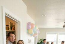 On my baby boy’s one-month celebration, the house buzzed with laughter and clinking glasses. I was adjusting his tiny bracelet when I heard a muffled gasp behind the pantry door. Then his voice—my husband’s—low and hurried: “Hurry… she’ll never notice.” A woman whispered back, “You promised tonight was ours.” My stomach dropped. I pushed the door—one second of silence, then shock. I didn’t scream. I just smiled, turned back to the party… and began planning what they’d never see coming.