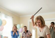 I was eight months pregnant, standing under pastel balloons, when my friends cheered, “For you—and the baby.” Someone whispered, “We raised $49,000 for your medical bills.” I was crying, laughing… until my mom’s eyes locked on the donation box. “Move,” she snapped, grabbing for it. “Mom, no—this isn’t yours!” Her smile vanished. She reached behind the table, yanked out a heavy iron rod from the decorations, and hissed, “You don’t deserve this.” Then—CRACK. The blow slammed into my belly. A hot, terrifying rush… my water broke instantly.