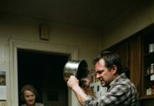 I’m eight months pregnant. After a brutal night shift, I barely make it through the door before my husband’s voice snaps like a whip: “Lazy. Can’t you get up and cook?” My mother-in-law scoffs, “So pregnancy is your excuse for being useless?” I try to rise—then BANG. He slams the rice pot into my head. The room tilts, my ears scream, and I swallow my cry. Later, I set the table calmly… and serve the one dish I’ve prepared for weeks: divorce papers. But they don’t know what else I’m bringing. Yet.