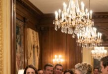 At my sister’s engagement party, Daniel’s mother looked at my simple dress and said coldly, “Sweetheart, the staff usually comes through the back door.” The room laughed, and I almost walked away—until I heard Daniel proudly telling investors, “The merger is already secured.” That’s when I stepped forward, grabbed the microphone, and said quietly, “You might want to rethink that… because the company you’re celebrating tonight? I’m the one who owns it.” The silence that followed changed everything—and what happened next shocked the entire room.