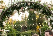 In the middle of my wedding, my sister leaned in close and whispered, ‘Sign over the five apartments, or this wedding ends right now.’ Then she waved those photos in front of me like she’d already won. My hands were shaking—but not from fear. I took the mic, looked straight at her, and said, ‘Before this ceremony continues, I have three things everyone deserves to know.’ After the first one, she turned ghost white…