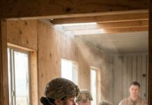 For two weeks they laughed at me, calling me “dead weight,” the worst soldier in the entire class, and honestly I let them believe it—until the day the black SUV rolled onto the range and a Navy commander stepped out, looked straight at me and said three words: “Keane… Ghost Knife… Execute.” I remember the silence, the shock on their faces as everything changed in seconds… but the truth is, that moment wasn’t the beginning of the story—it was the moment they finally realized who they had been mocking all along.