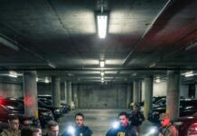 For two years they thought I was just the janitor at a secure naval facility, the quiet old man pushing a mop down empty hallways—until one young Navy SEAL froze, stared at the tattoo on my arm, and whispered, “Sir… you’re supposed to be dead.” That was the moment everything unraveled, because the men who buried my team twenty years ago never expected the ghost to walk back in—and this time, I wasn’t here to clean floors.