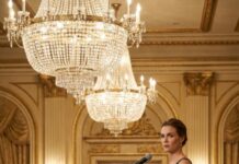 Four days before our company’s New Year’s gala, I stood in the hallway holding my husband’s dry cleaning and heard him laugh, “She’ll make a scene. Double or nothing—she cries before dessert.” They were betting on my breakdown. What they didn’t know was I had already filed the paperwork that would dismantle everything he thought he owned. When I stepped onto that stage and said, “Effective midnight, I’m in control,” the room went silent—but the real shock was only beginning.