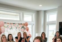 My future mother-in-law slapped me across the face in the middle of my bridal shower and shouted, “You gold-digging little liar!” The room went dead silent—until my future sister-in-law laughed. I stood there shaking while phones started recording, every eye locked on me, waiting to see if I’d cry. I didn’t. I looked straight at her and said, “Are you sure you want to do this in public?” She had no idea that one sentence was about to ruin everything.