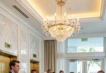 I stepped into the Miami luxury hotel clutching my worn handbag, and the lobby went quiet. Jessica’s smile sharpened. “We don’t have rooms for… your type,” she hissed, loud enough for everyone to hear. My chest burned—but then Mia stepped forward. “Ma’am, you will not speak to her like that.” Jessica snapped, “Choose—your job or the poor.” I watched Mia run after me, apologizing… until Adrien appeared. His voice dropped: “Grandma?” And that’s when my test truly began.