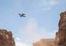 I remember the exact moment the radio went silent over Gray Line 12. Someone in the command tent whispered, “No pilot is crazy enough to fly that canyon again.” I stared at my old A-10 and said quietly, “Then it has to be me.” Minutes later a missile locked onto my engines and a voice screamed through the headset, “Tempest Three, break off now!” I gripped the stick and muttered, “Not today… those men are going home.” What happened next is something I still struggle to explain.