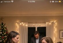 I spent the entire Christmas cooking for my husband’s family while pregnant, only for my mother-in-law to sneer, “Servants don’t sit with family.” When I finally pulled out a chair, she shoved me so hard I hit the counter. As pain tore through my stomach, my husband threw my phone across the room and whispered coldly, “I’m a lawyer. You won’t win.” I looked him in the eyes, bleeding, and said quietly, “Then call my father.” He laughed while dialing… not knowing who would answer.