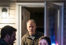 I staggered out of the ER with the plastic bracelet still biting my wrist when Derek grabbed my face and slammed me into the door. “You know what time it is, Emily?” he snarled. “My mom and I are starving.” Blood filled my mouth. Then the front door creaked open—and my father’s voice cut through the haze: “Take your hand off my daughter.” The sirens started… and I realized this night was about to change everything.