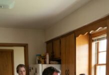 I stumbled in from the ER with my hospital bracelet still on, and Mark’s hand cracked across my face. “Do you know what time it is, you useless liar?” he snarled, while his mother smirked behind him and my six-year-old son froze in the doorway. I whispered, “Please… I was in the hospital,” and he raised his fist again. Then I saw my father …