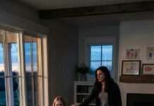 I dropped the keys the moment I saw the children’s drawings covering my dead husband’s farmhouse walls. “Who are you?” I demanded, staring at the terrified teenage girl at the top of the stairs. “He promised we were safe here,” she cried—just as a truck pulled into the driveway. Then the man outside smiled and whispered, “Accidents happen on roads like these.” That was the moment I realized my husband didn’t just die… and I was standing in the middle of something far darker than grief.