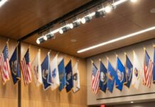 My sister burst out laughing the second I walked into dinner. “Nice costume,” she snorted, eyes raking over my dress uniform like it was a joke. Forks paused. Faces turned. I kept my voice calm. “It’s not for you.” Then her fiancé—Special Forces—stiffened. His gaze locked on the patch at my shoulder. Color drained from his face. He pushed back his chair, stood, and snapped a salute. “Yes, ma’am.” The room froze. My sister’s laugh died mid-breath. And that was the moment I realized… she hadn’t been laughing at my uniform at all.