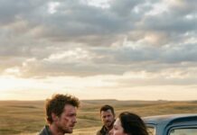 “I heard her scream my name as the blizzard swallowed me whole. One second I shoved her to safety; the next, I was gone—buried, broken, reborn into a life no one was meant to survive. For years, she searched. For years, I stayed dead. Then on that silent prairie, she turned, saw me, and whispered, ‘No… it can’t be.’ She thought finding me was the miracle. She had no idea it was the beginning of the nightmare.”