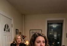 She flung her fur coat at my chest like I was hired help. “Hang it up—and stay out of the way!” At dinner, she savaged everything: “These salads are sad, the duck is DRY, and this daughter-in-law is… mediocre.” My husband stared at his plate. I felt my hands stop shaking. I leaned in, smiled, and said just two words: “Not anymore.” She shot up, bolted for the door—then I noticed what she left behind… and why.