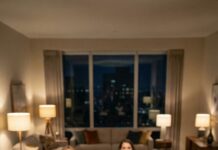 He raised his glass and bragged, “Yeah, supporting a family isn’t easy—but I manage.” Guests nodded, impressed. Then my mother-in-law chimed in, stroking his hair like he was a hero: “And he even sends me $1,500 regularly!” My stomach dropped—because I knew his paycheck was only $150. I forced a smile, then snapped, “So you’re feeding your mother with my money too?” Silence. I leaned closer and whispered, “Fine… here’s what we’re going to do next.”