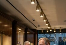 I pushed open the glass door, my dusty shoes squeaking on marble. Emily’s smile froze. “Sir… are you lost?” she whispered, eyes slicing over my worn coat. “These pieces start at five figures.” My throat tightened, but I kept calm. “I’m looking for a graduation necklace for my granddaughter.” She scoffed, “Try a pawn shop.” Then Mr. Harris stepped in—warm, respectful. “Welcome. Let me help you.” I thanked him and left. Next morning, my Rolls-Royce stopped outside. I walked in wearing a tailored suit. Emily went pale. “I wasn’t shopping yesterday,” I said softly. “I was testing.” And the real lesson? It wasn’t over yet.