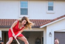 I was seven months pregnant when the parking guard called: “Ma’am… you need to see your car.” I ran downstairs and froze—my SUV was destroyed, and carved into the door were the words: “HOMEWRECKER” and “BABY TRAP.” Then the security video played… and I heard myself whisper, “Brittany?” My husband’s voice hit my phone: “Elena, don’t call the cops—please.” I smiled. “Too late.” But what he didn’t know? This was just the beginning.