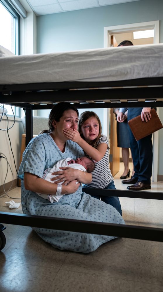 Mother_and_daughter_hiding_under…_202607191123